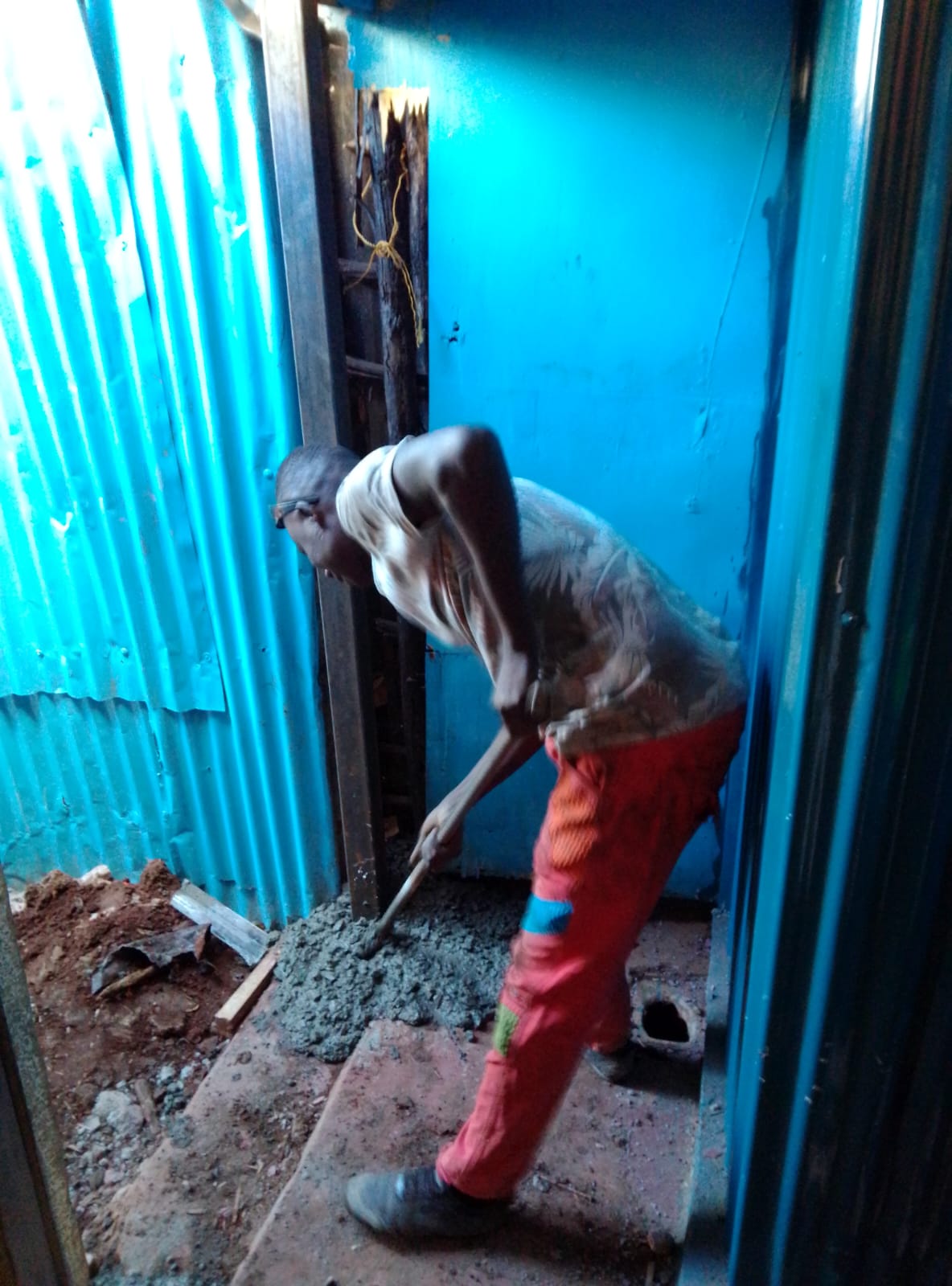 A smoky kitchen with two staff almost obliterated by thick smoke